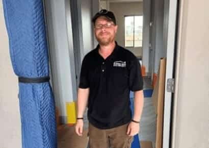 Professional local movers from EZ Breezy handling a residential move in the Tangletown neighborhood.