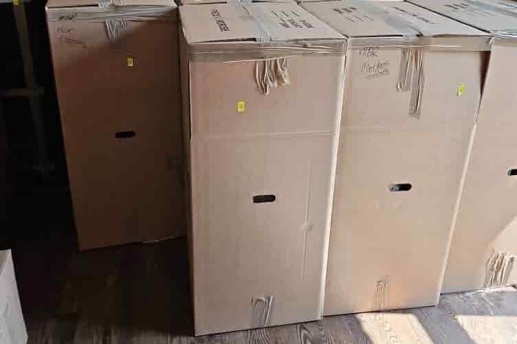Wardrobe boxes packed for apartment relocation by Minneapolis movers