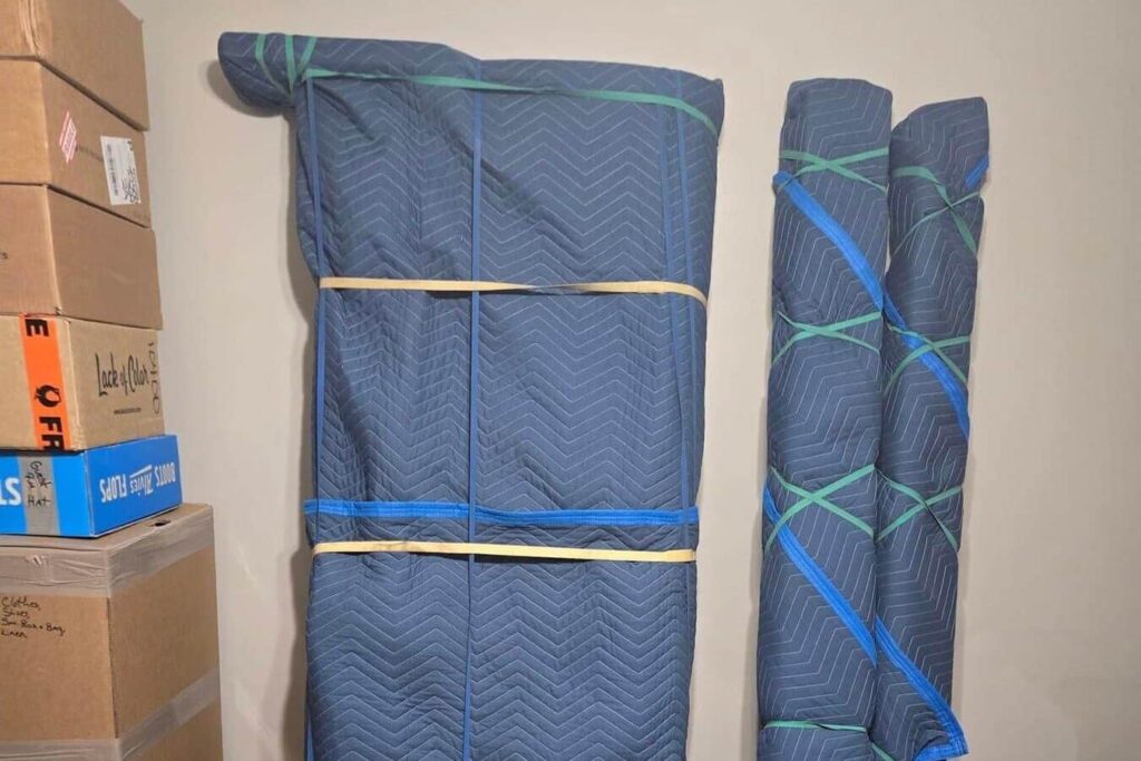 Professionally wrapped furniture and supplies ready for move